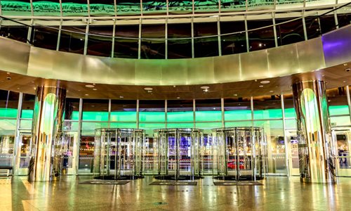 Inside the large lobby of The CCD, looking out the glass facade