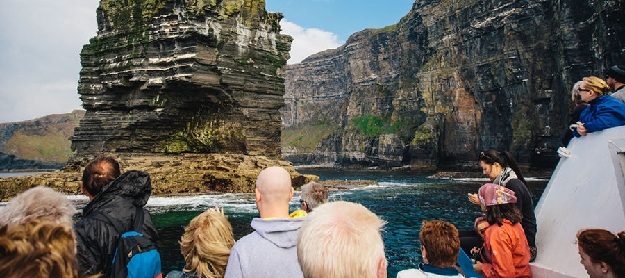 Delegates enjoying a boat tour at the Cliffs of Moher, Co. Clare