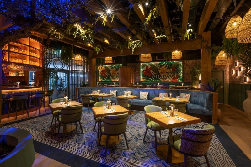 A view of the bar with a courtyard aesthetic in the Hyde Hotel Co. Galway