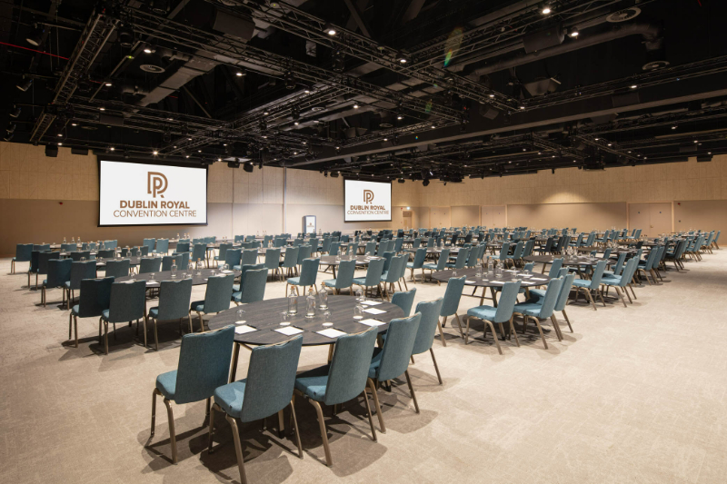 Convention room at the Dublin Royal Convention Centre, set up with tables and chairs for a large event