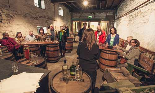 Delegates enjoying an evening in Kilbeggan Distillery