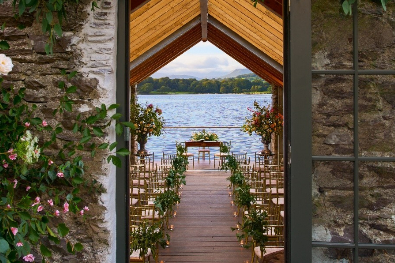 The boathouse in the sheen falls lodge, co Kerry, decorated with leaves for a wedding.