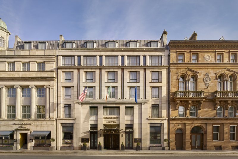 Exterior view of The College Green Hotel in Dublin, showcasing its classic architecture and central city location