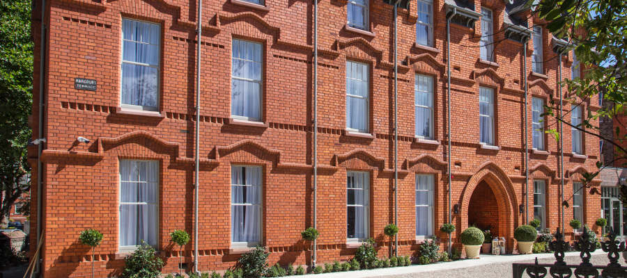 Wilder_Exterior_900x400.jpg Red-brick exterior of the Wilder Townhouse