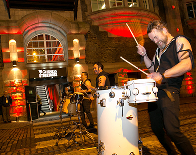 Drummers playing a concert outside the Guinness Storehouse, Dublin