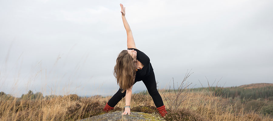 Woman stretching during outdoor yoga