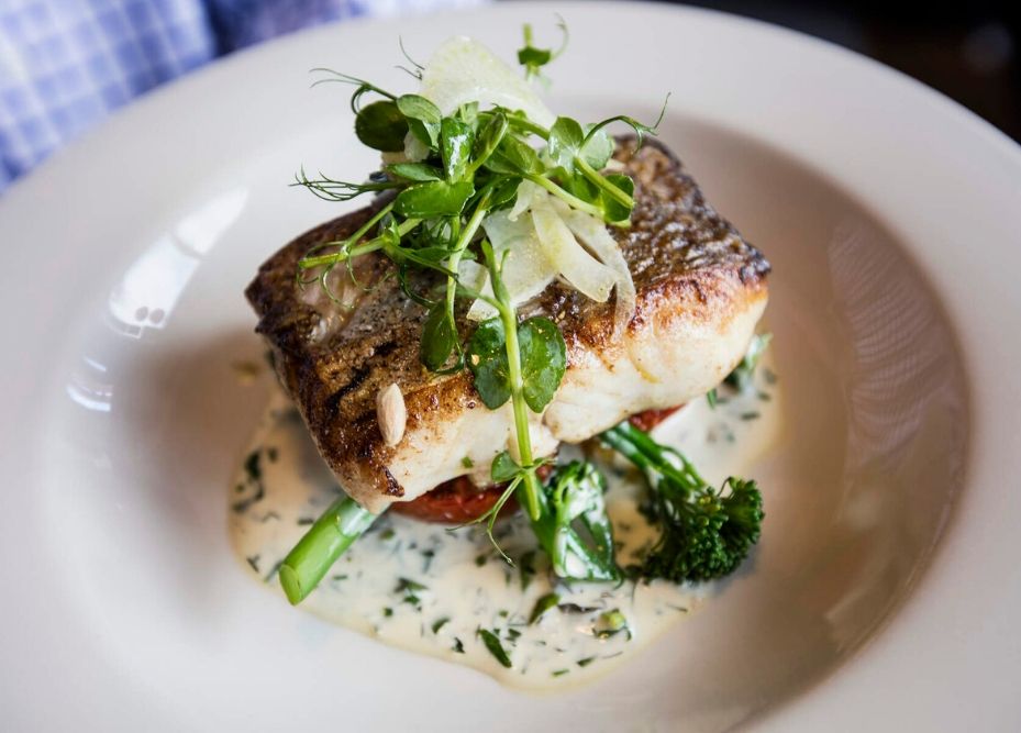 Two women cycling the winding roads on the Aran Islands