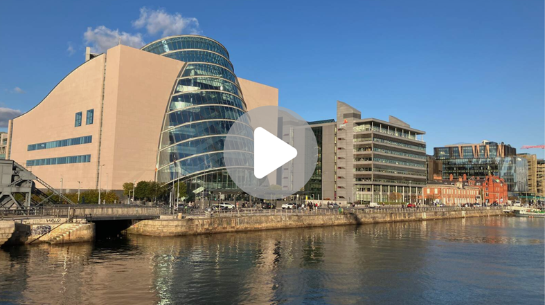 Video thumbnail showing the convention centre in Dublin with a play button in the centre of the image