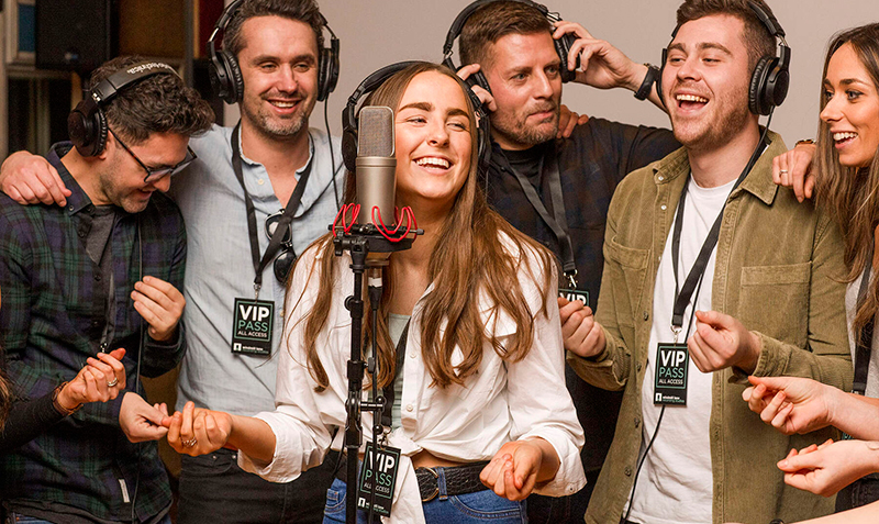 A group singing at windmill lane.